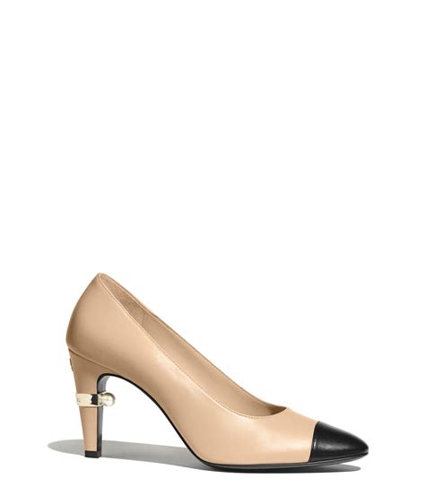 used chanel pumps|Chanel pumps beige and black.